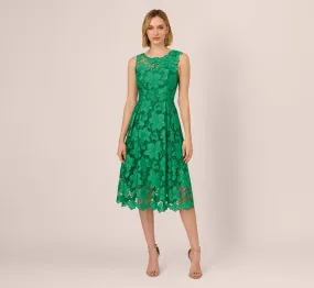 Lace Sleeveless Midi Dress With Sheer Neck And Hem In Green